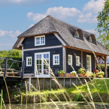 Luxe buitenhuis in landelijke stijl