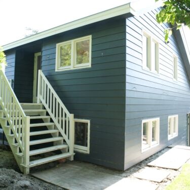 Uitbreiding woonhuis, sluis en verlenging dak bestaande woning