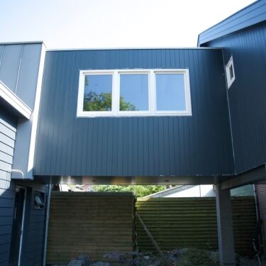 Uitbreiding woonhuis, sluis en verlenging dak bestaande woning