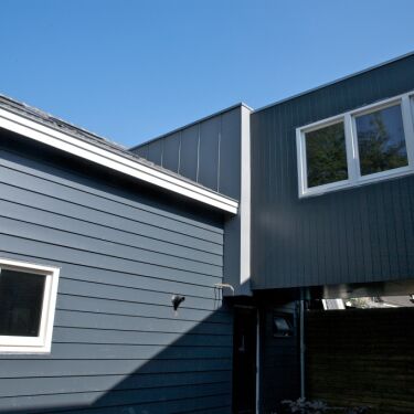 Uitbreiding woonhuis, sluis en verlenging dak bestaande woning